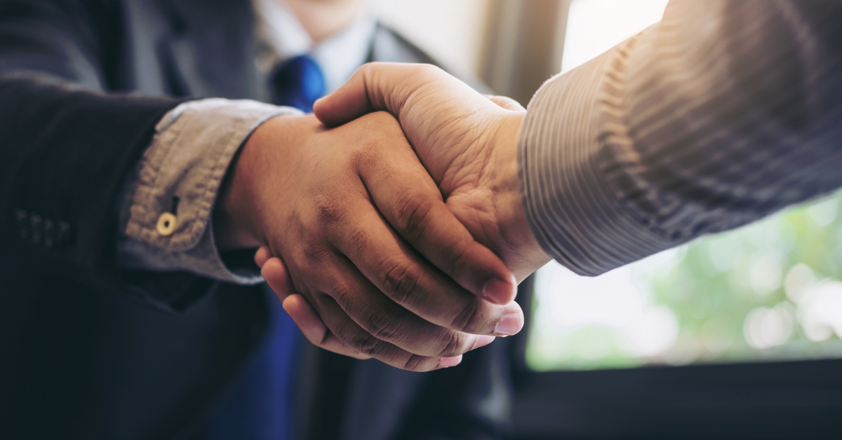 two people shaking hands