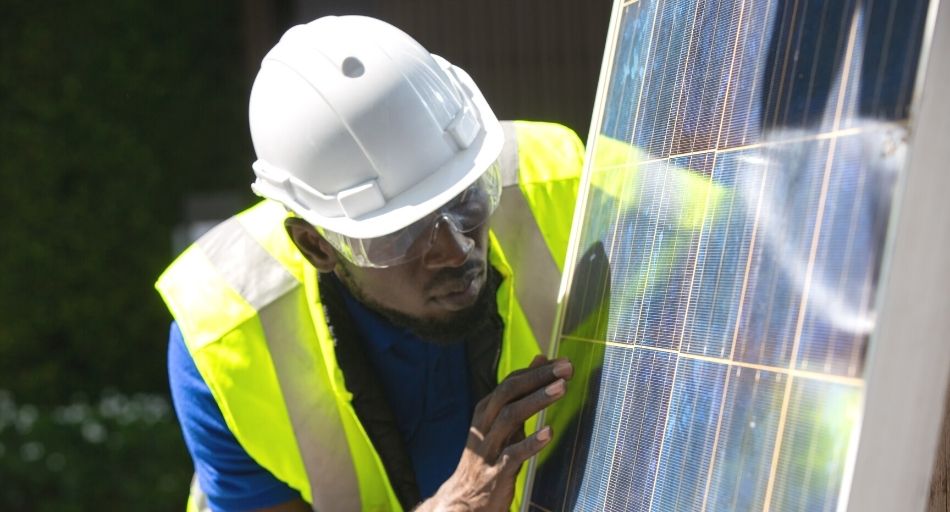 construction engineer with solar panel