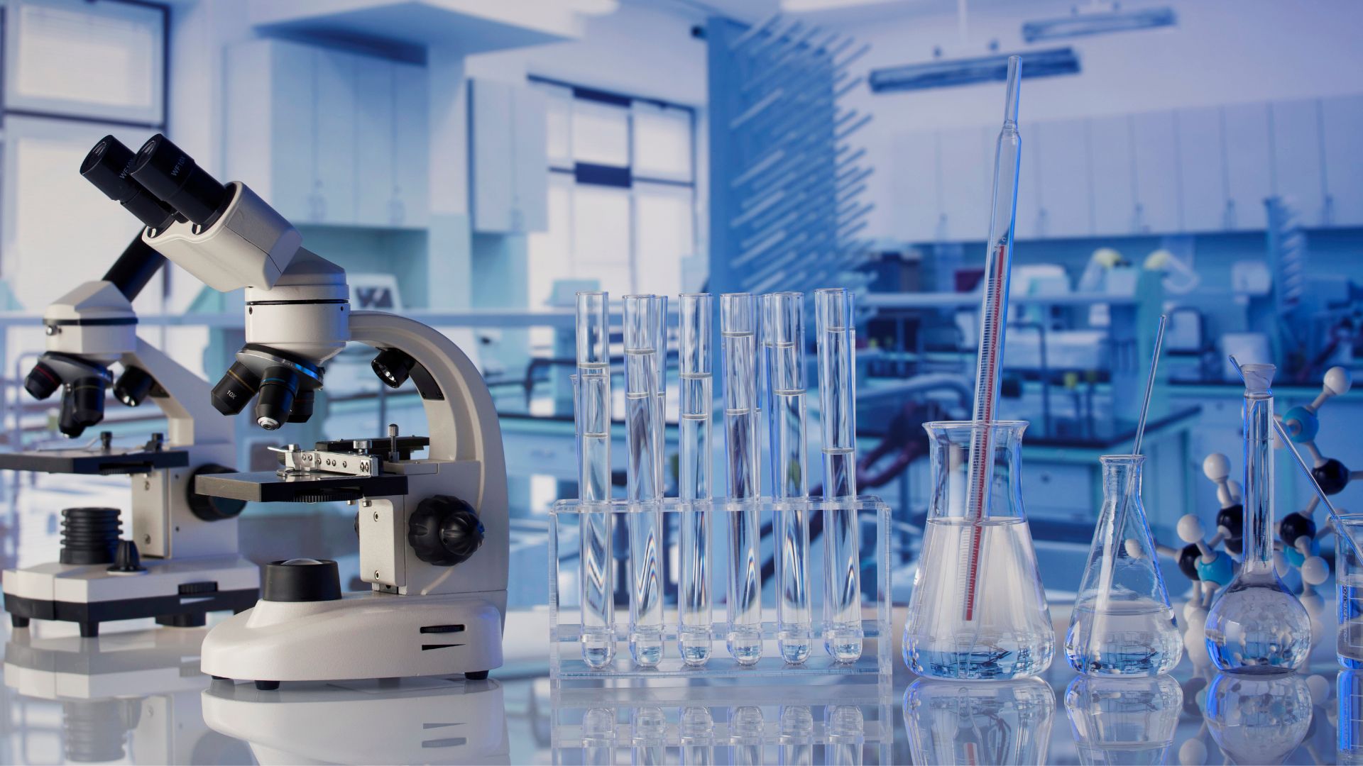 microscope and test tubes in laboratory