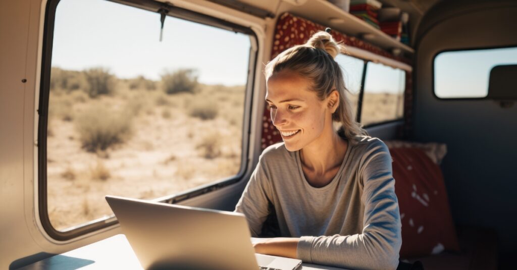 nomadic project manager working from laptop in RV